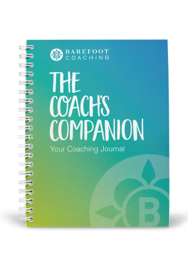 A ring bound coaches companion booklet.