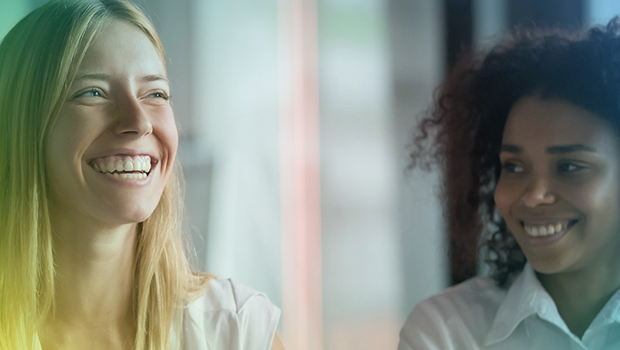 Two woman laughing.